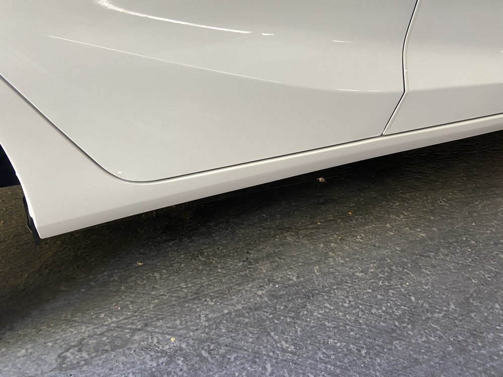 The same rocker panel, straight and painted